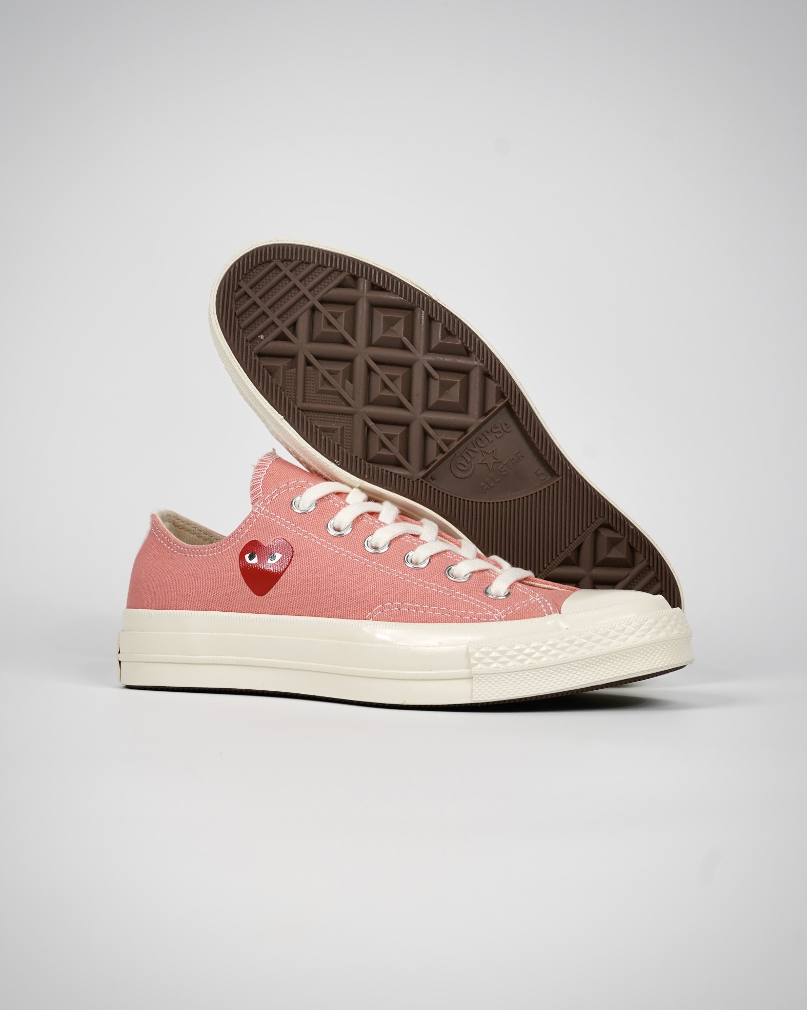 Converse CDG play low pink
